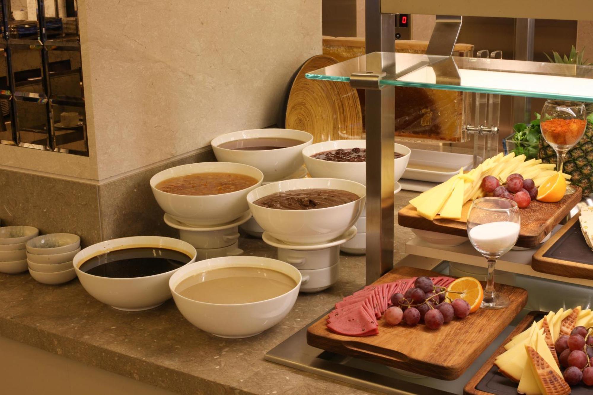 Bentley Hotel Bosphorus - Special Class Istanbul Exterior photo A selection of various jams and honey